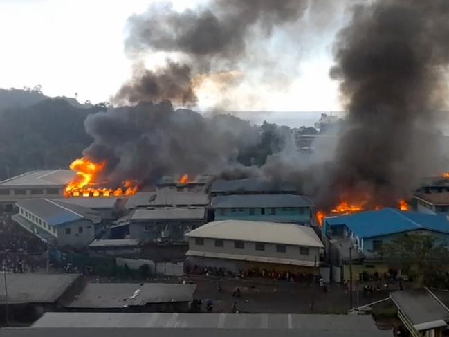 The Chinatown district on fire in Honiara on Solomon Islands. Picture: JOB RONGO'AU FUOO / ZFM Radio / AFP