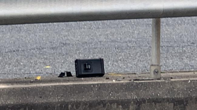 The injured police officer’s LiDAR scanner could be seen lying on the median strip on the road. Picture: Danielle Buckley