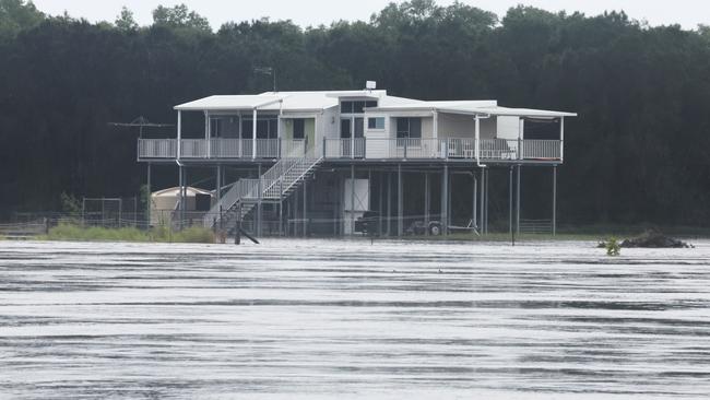 Flooding on the Gold coast in the aftermath of Cyclone Alfred. Stapylton homes surrounded by floodwaters. Picture Glenn Hampson