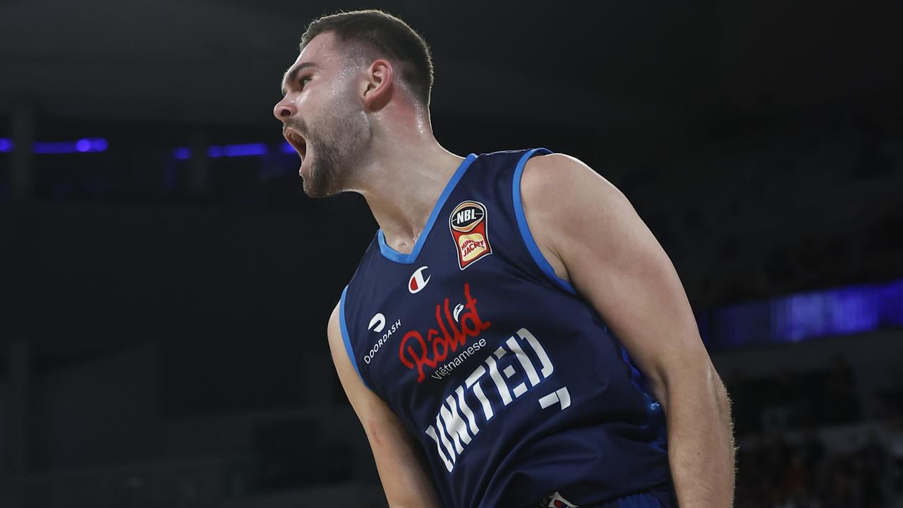 Isaac Humphries celebrates after dunking the ball. Picture: Getty Images)