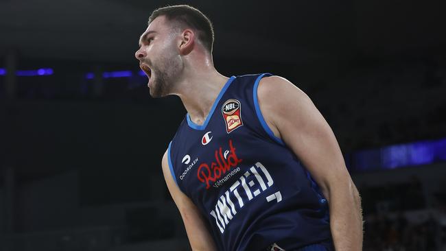 Isaac Humphries celebrates after dunking the ball. Picture: Getty Images)