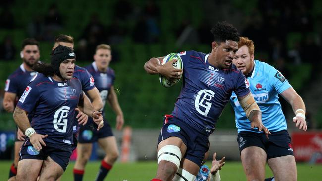 Lopeti Timani of the Rebels runs the ball forward during the Round 17 Super Rugby match between the Melbourne Rebels and the NSW Waratahs at AAMI Park in Melbourne, Friday, June 29, 2018. (AAP Image/Hamish Blair) NO ARCHIVING, EDITORIAL USE ONLY