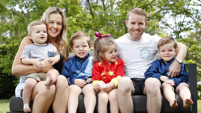 Jockey Tommy Berry at home with his wife Sharnee and children (from left) Nate, Levi, Charlise and Kaden. Picture: Jonathan Ng