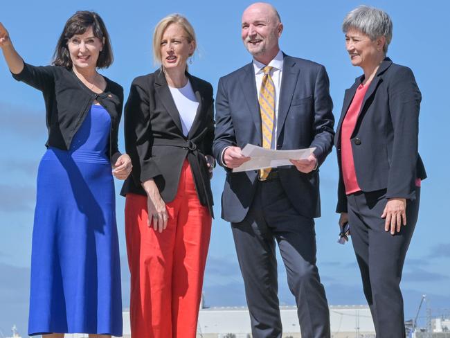 ADELAIDE, AUSTRALIA - NewsWire Photos MARCH 16, 2023: Acting Premier of South Australia, the Hon Susan Close MP, Minister for Finance, Senator the Hon Katy Gallagher, Australian Naval Infrastructure CEO Andrew Seaton and Minister for Foreign Affairs, Senator the Hon Penny Wong at Snapper Point on the Port River. This will be the site of the new shipyard to build the AUSKUS submarines north of the ASC site. Picture: NCA NewsWire / Brenton Edwards