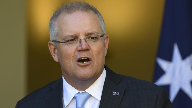 Australian Prime Minister Scott Morrison is not considering winding up JobKeeper early. (AAP Image/Lukas Coch)