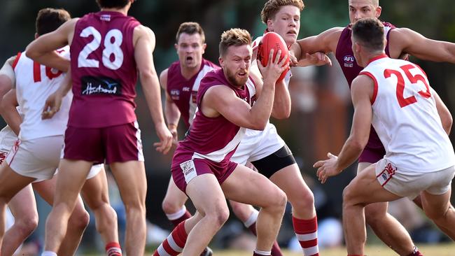 The Manly Warringah Wolves, in maroon against St George, have been acknowledged for fostering great young AFL talent. Picture: Troy Snook