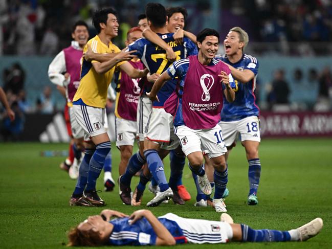 Japan's players react after the full time whistle. Picture: Anne-Christine Poujoulat/AFP