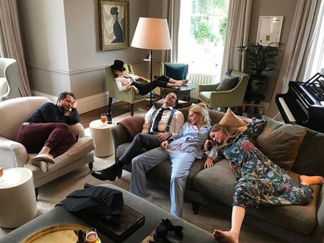 Party animals. This image from scoial media shows (l-r) Derek Blasberg, Cara Delevingne, Dave Gardner, Poppy and Chloe Delevingne relaxing after the royal wedding of Princess Eugenie and Jack Brooksbank.