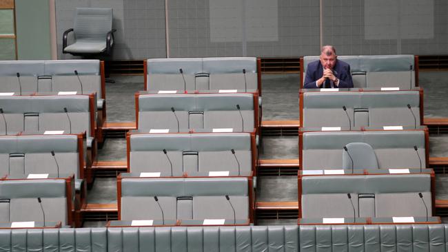 All alone, Craig Kelly sits in the House of Representatives. Picture: Gary Ramage