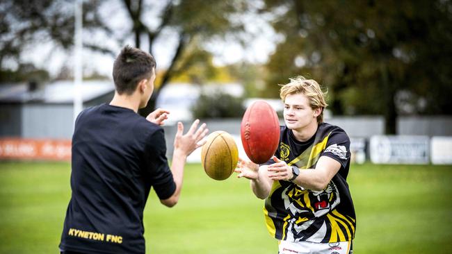 Louis Thompson — the son of Nathan Thompson — and Bailey McGee both play for Kyneton. Picture- Nicole Cleary