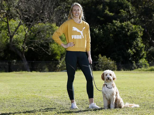 Olympian Anneliese Rubie-Renshaw with her Bordoodle dog Finley. Picture: John Appleyard