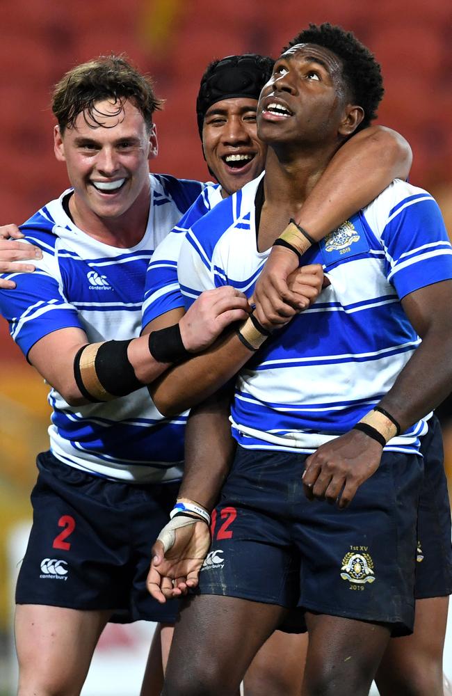 Lastus Auakai of Nudgee College celebrates scoring a try. Picture: AAP Image/Dan Peled