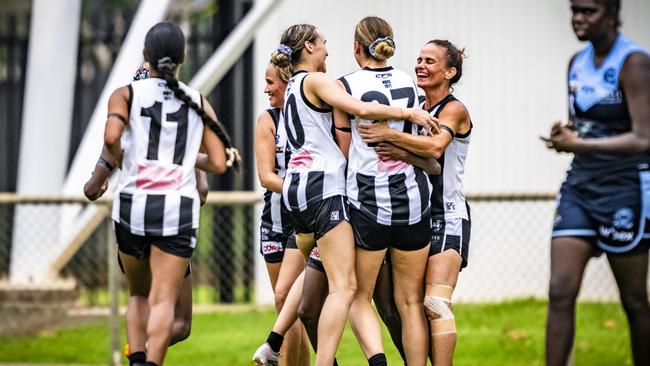The Palmerston Magpies women celebrate their win over the Darwin Buffettes in Round 14 of the 2023-24 NTFL season. Picture: Patch Clapp / AFLNT Media