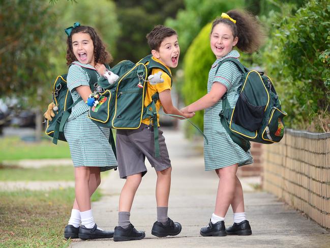 Kids preparing to go back to school - habits parents should get their kids into before the term starts.Esta Calafati, 7, Matteo Calafati, 8 and Leah Tempone, 7, who attend St Oliver's Plunkett Primary School.Picture : Nicki Connolly