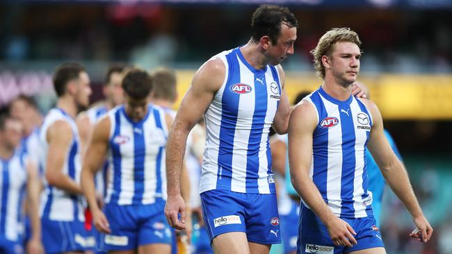 Todd Goldstein and Jason Horne-Francis after the final siren. Picture: Matt King/AFL Photos