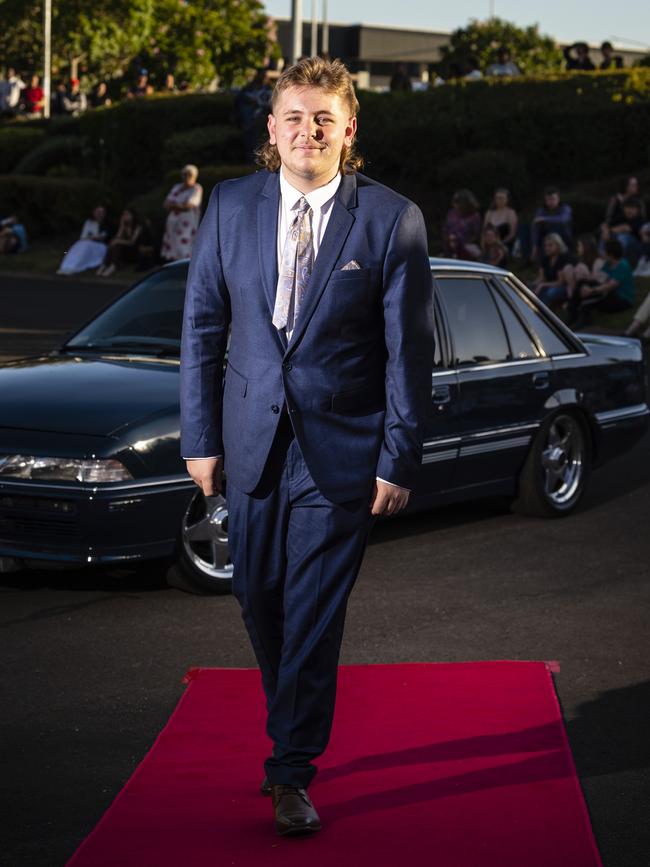 Bailey Turner arrives at Harristown State High School formal at Highfields Cultural Centre, Friday, November 18, 2022. Picture: Kevin Farmer