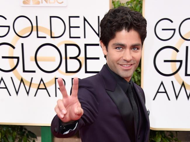 Entourage star Adrian Grenier arrives.