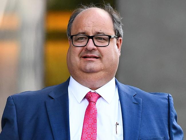 Clive Mensink, the nephew of Clive Palmer, leaves the Supreme Court in Brisbane, Wednesday, April 20, 2016. Mr Mensink Mr Mensink has asked the court to issue an injunction preventing the Queensland Nickel administrators from appointing receivers to three other Palmer nickel companies who were in a joint venture with QN. (AAP Image/Dave Hunt) NO ARCHIVING