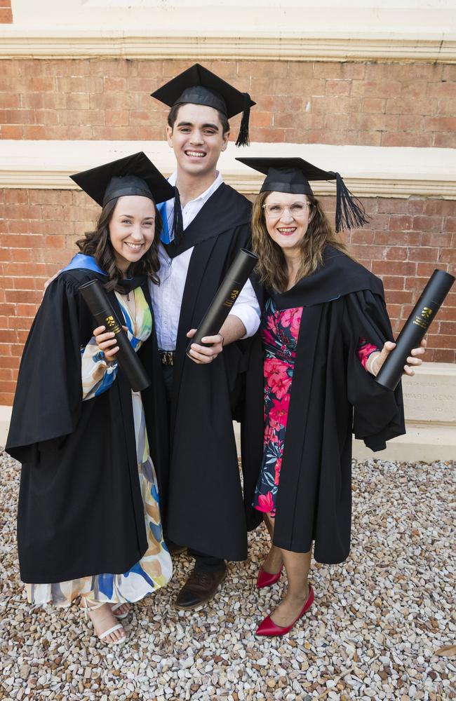 Bachelor of Nursing graduate Louise McDonald (right) with fellow graduates daughter Sophie Edser and son-in-law Ryley Edser at the UniSQ graduation ceremony at Empire Theatre. Picture: Kevin Farmer