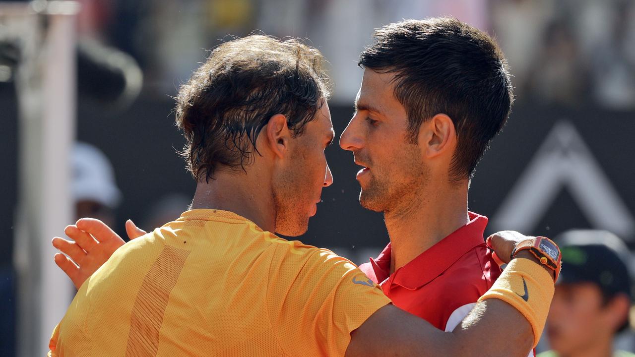 Spain's Rafael Nadal hugs Serbia's Novak Djokovic at the end of their semifinal match at the Italian Open tennis tournament in Rome