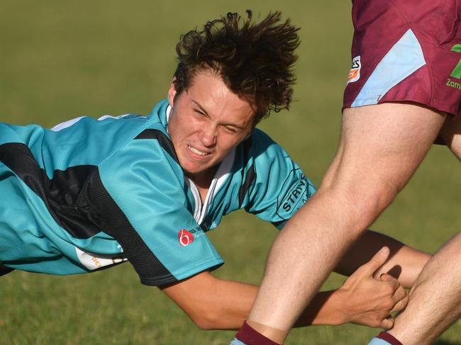 Townsville A Grade rugby union match between Teachers West and Western Suburbs at Warrina Park. Teachers Shamus Howlett and Suburbs Hamish Wood.  Picture: Evan Morgan