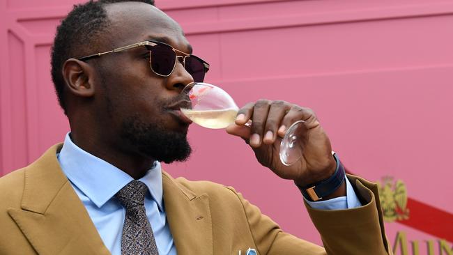 Usain Bolt was partying it up in the Mumm marquee during Oaks Day.