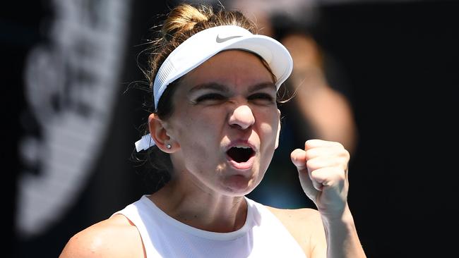 Simona Halep celebrates winning through to the quarterfinals. Picture: AFP