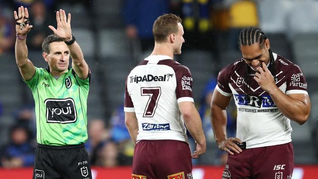 Taupau walks after his high tackle on Ray Stone. Photo: AAP Image/Brendon Thorne