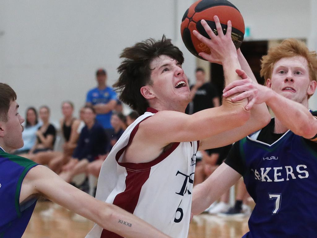 Basketball Australia Schools Championships at Carrara. Mens open final, Lake Ginninderra College Lakers V TSS (in white). the Lakers defence gave Benjamin Tweedy from TSS special attention in the final. Picture Glenn Hampson