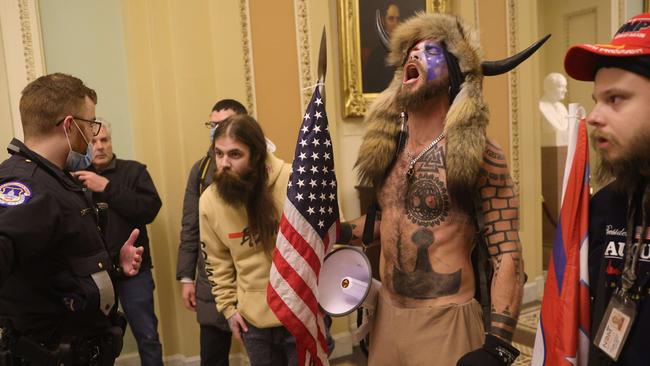 Protesters with Capitol Police inside the US Capitol Building on Thursday. Picture: Getty Images/AFP