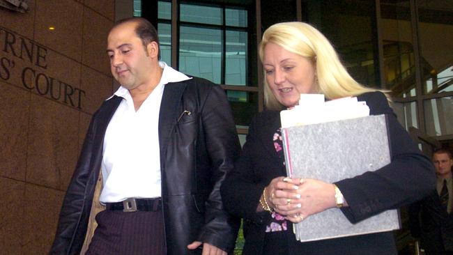  Tony Mokbel leaves Melbourne Magistrates Court with his lawyer, Nicola Gobbo. 