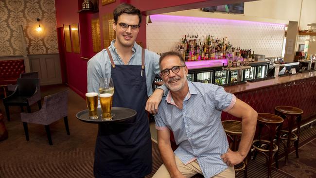 The Malvern Hotel won best metropolitan pub restaurant at the awards. Pictured are bar tender Jack Bines and part-owner Ken Price. Picture: Andy Brownbill