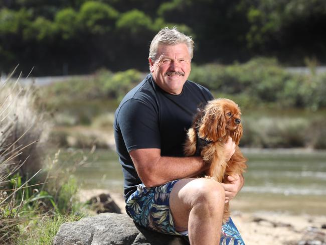 Channel 7 commentator Brian Taylor at home in Lorne with his dog Hansel. Picture: Alex Coppel.