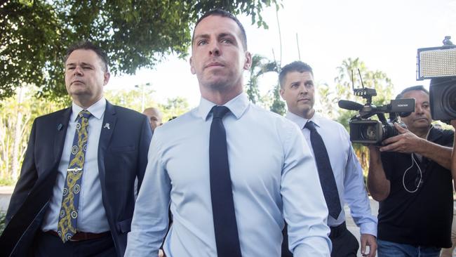 Zachary Rolfe (centre) arrives at the Supreme Court of the Northern Territory in Darwin.