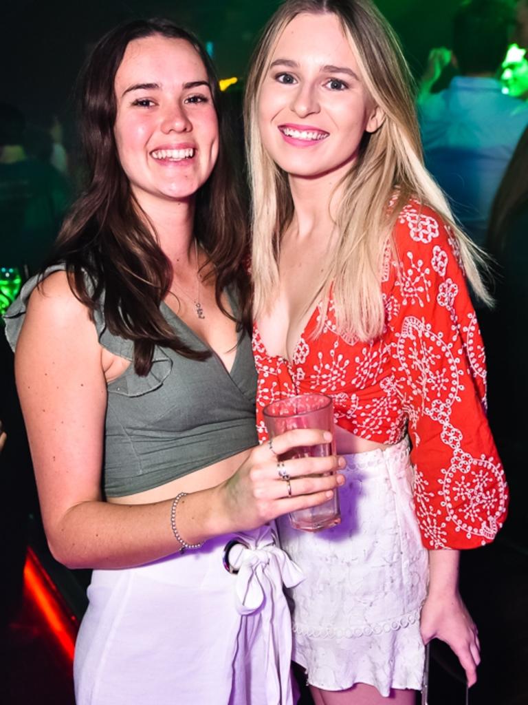 Taylor Sewell and Ella Lockley kick back at Retros on Friday night.