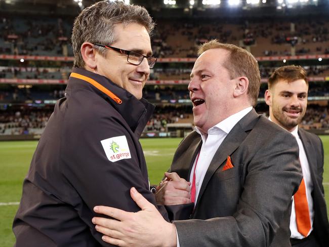 GWS coach Leon Cameron is congratulated by club chief David Matthews after the Giants’ win against Collingwood. Picture: AFL Photos