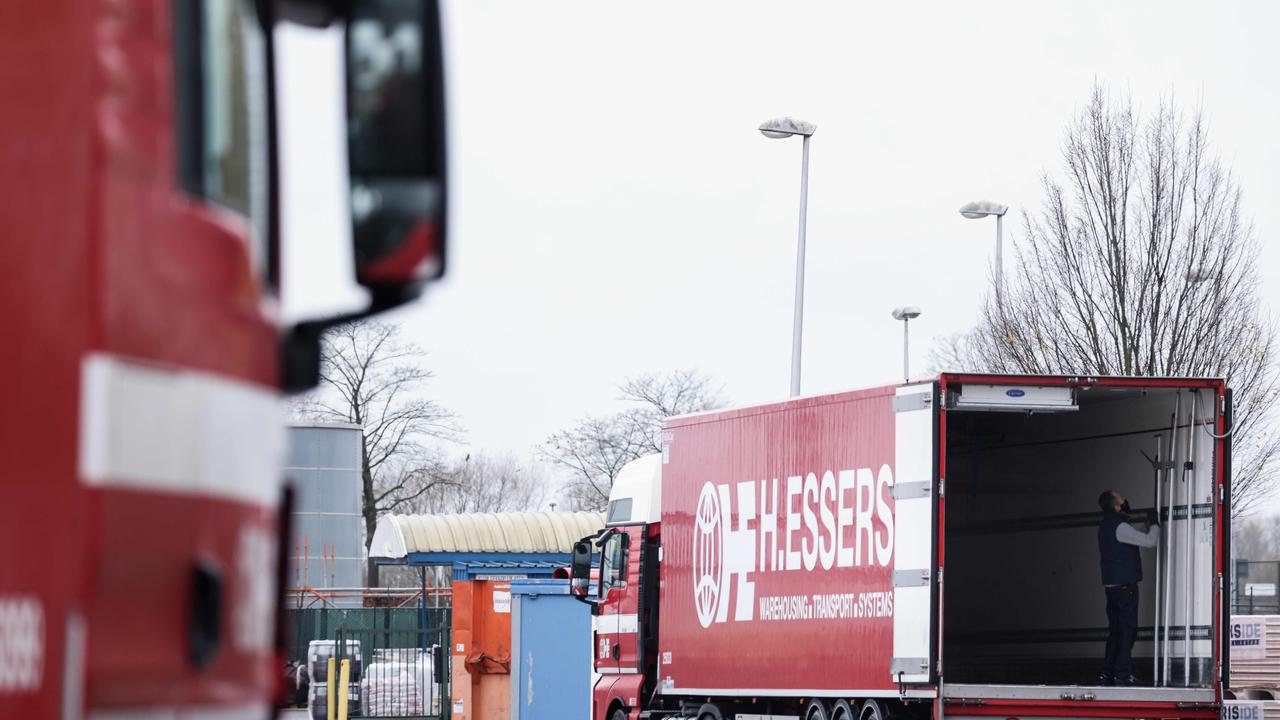 Trucks being loaded at a Pfizer factor, in Puurs, Belgium, where COVID-19 vaccines are being produced. Picture: Kenzo Tribouillard/AFP