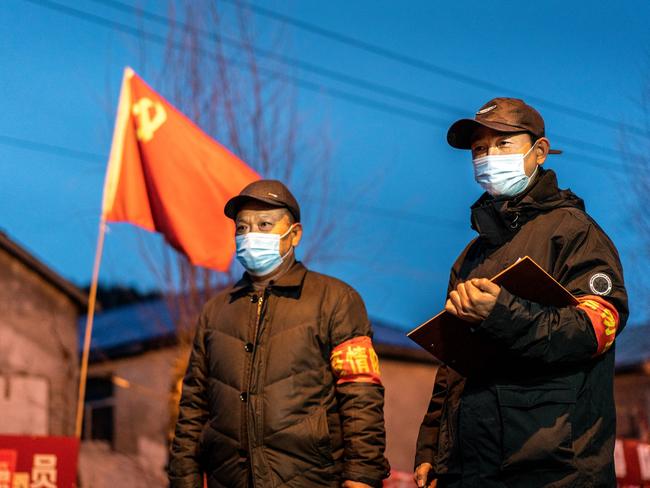 Officers at a checkpoint in Harbin. Picture: AFP