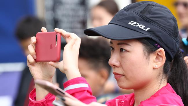 A Japanese spectator looks on at the Gold Coast Marathon. Photograph: Jason O'Brien.