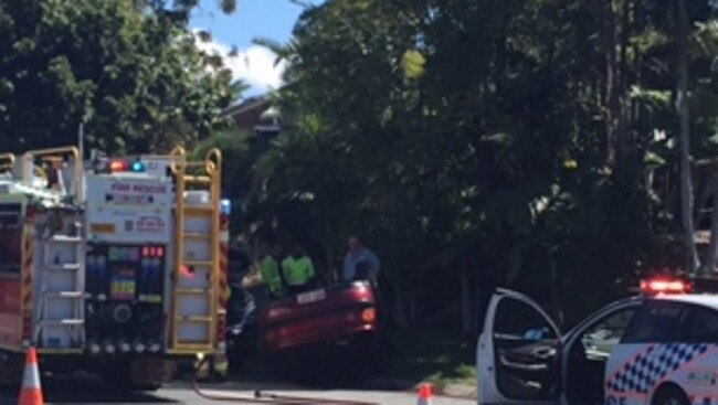 A man has been injured when his car rolled on Central St, Arundel this morning. Photo: Jessica Elder