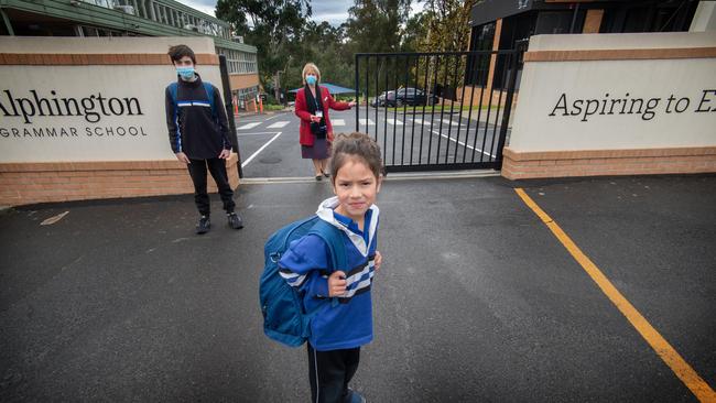 School students, Lily Anderson and Adam Coppolillo with school principal Dr Vivianne Nikou at Alphington Grammar School. Picture: Tony Gough