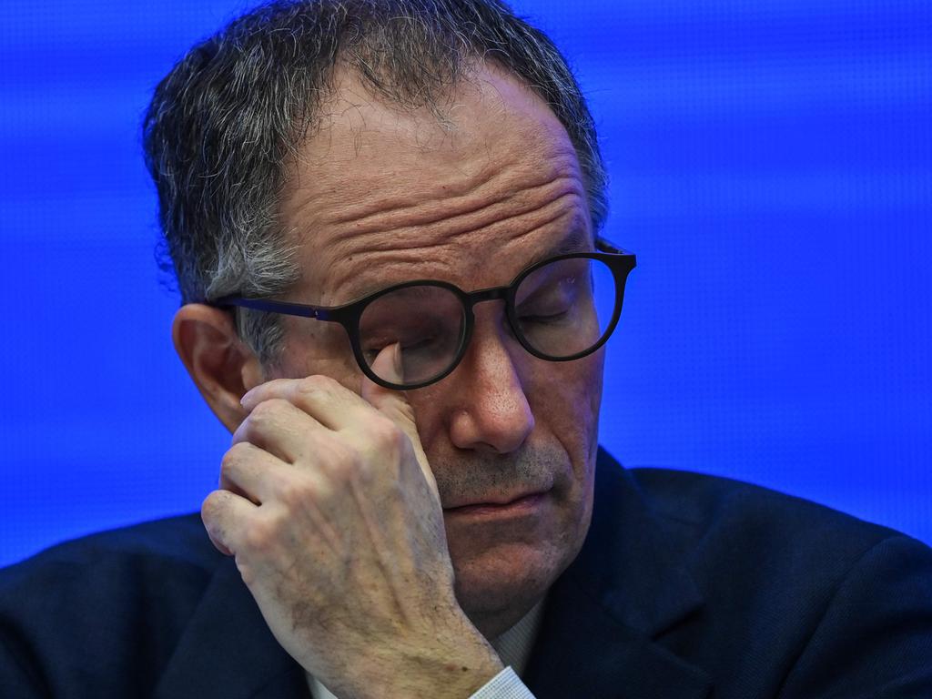 Peter Ben Embarek wipes his eye during a press conference to wrap up a visit by an international team of experts in the city of Wuhan. Picture: AFP