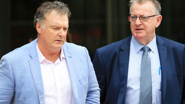 Former One Nation senator Rod Culleton (left) leaves the financial services royal commission in Melbourne. Picture: Aaron Francis.