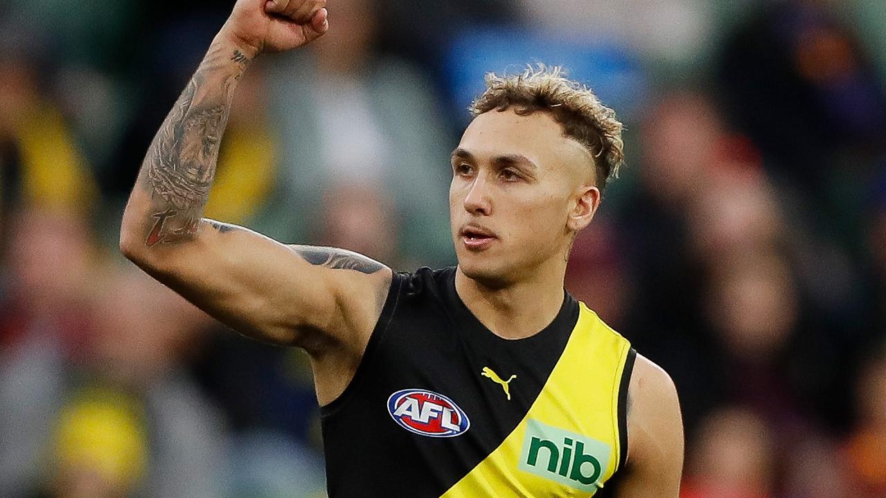 MELBOURNE, AUSTRALIA - JULY 31: Shai Bolton of the Tigers celebrates a goal during the 2022 AFL Round 20 match between the Richmond Tigers and the Brisbane Lions at the Melbourne Cricket Ground on July 31, 2022 in Melbourne, Australia. (Photo by Dylan Burns/AFL Photos via Getty Images)