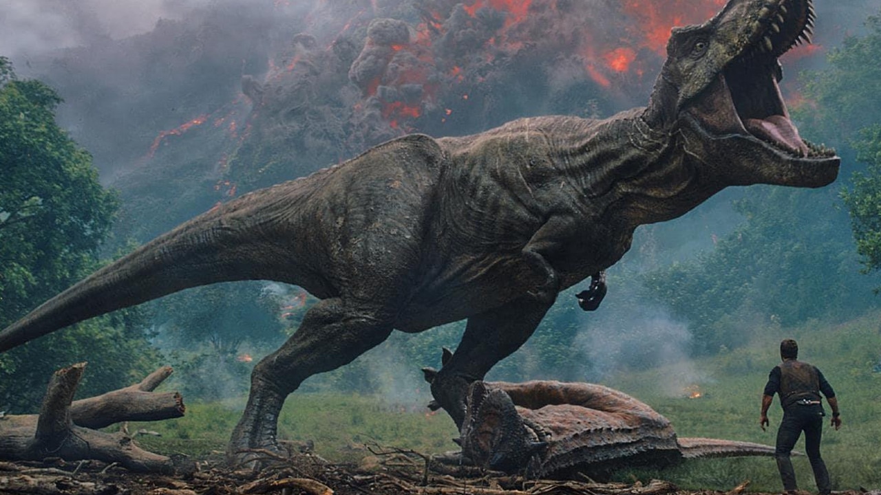 A rampaging T-rex dinosaur in a scene from the film Jurassic World: Fallen Kingdom. Therapods T-rex and elaphrosaur are cousins, but elaphrosaur was only 2m long and probably ate plants later in life. Picture: supplied