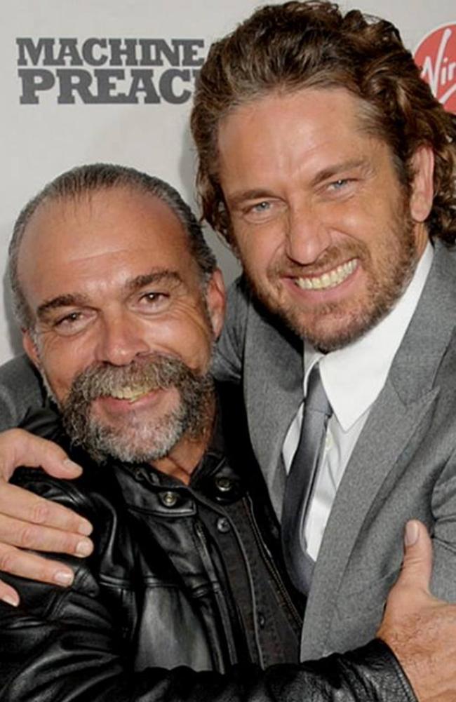 Sam Childers and Gerard Butler who plays him in "Machine Gun Preacher" at the 2011 movie premiere