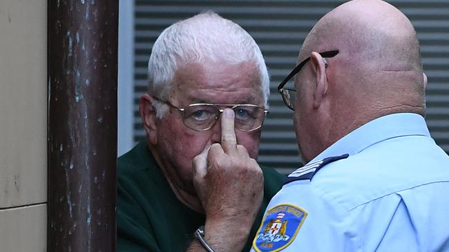 Leonard Warwick is escorted to a prison van at the Supreme Court on August 6, 2019. Photo Joel Carrett, AAP