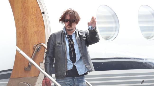 Johnny Depp on his arrival back in Australia. Photo: Adam Armstrong.