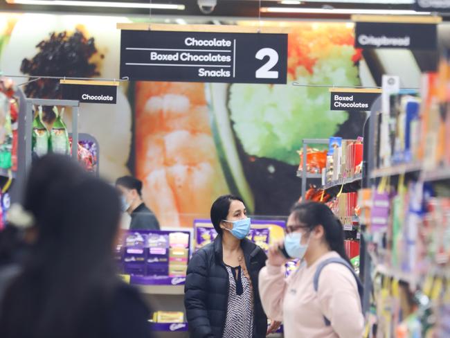 Meanwhile Woolworths has asked shoppers to wear face masks. Picture John Grainger