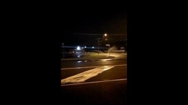 Gladstone man films council sprinklers after rain